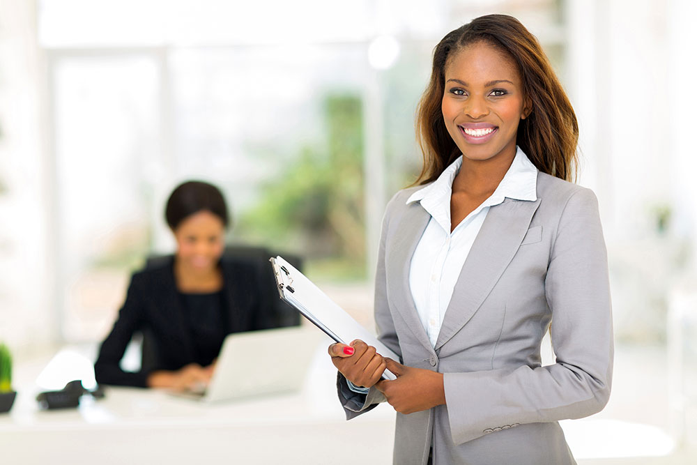 stock-photo-beautiful-african-businesswoman-holding-clipboard-206010211 Licenses and Designations