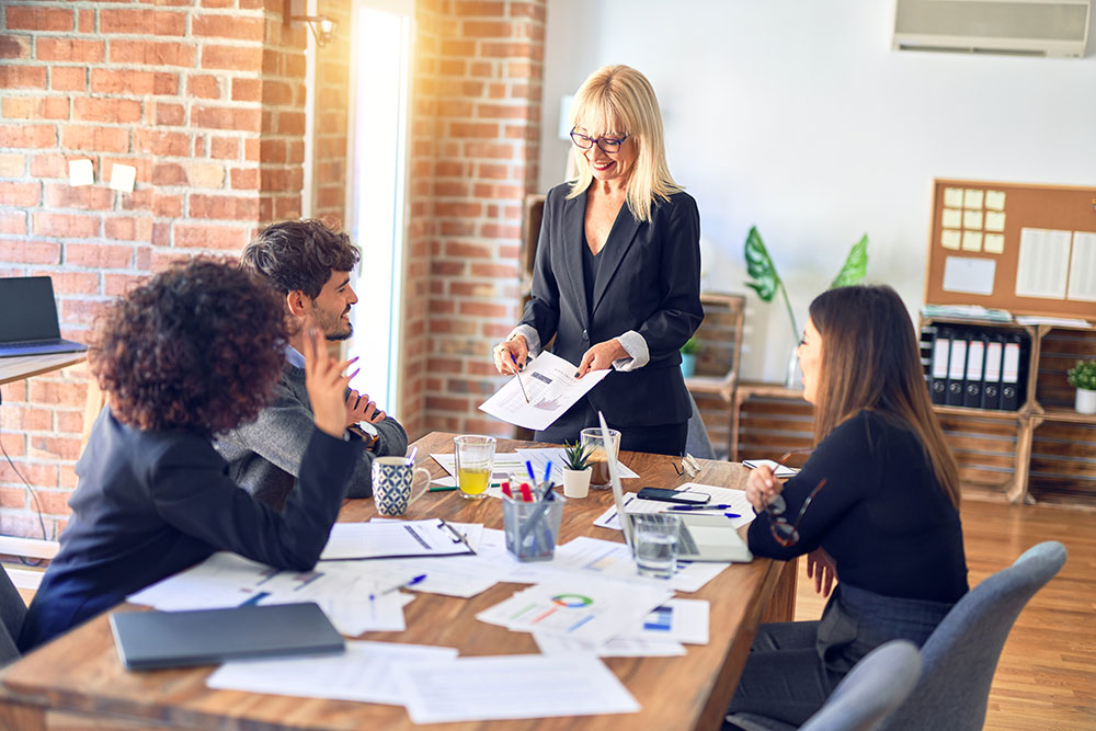 stock-photo-group-of-business-workers-smiling-happy-and-confident-working-together-with-smile-on-face-middle-1690287685 Professional Affiliations