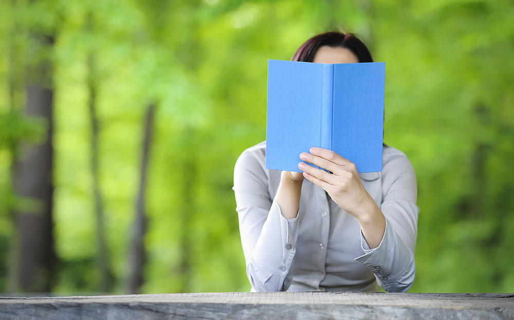stock-photo-woman-holding-book-in-front-of-her-face-267930092 Hobbies